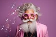 kidult concept photography, funny old man with silver hair, beard and mustache in pink jacket and pink glasses, around 60-70 years with bubbles all around