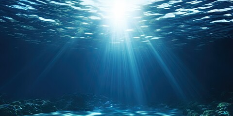 Beautiful blue ocean background with sunlight and undersea scene