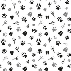 Wall Mural - Black and white seamless pattern with traces of various animals and birds. Vector isolated on white for design, print, textile, decoration of a store, stationery, pet store