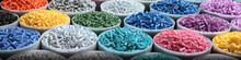 Recycled Crushed Plastic Granules Turned Into New Reused Material. Plastic Crossover. Recycled Plastic With Mixed Colors.