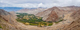 Fototapeta Sypialnia - Panorama of green Indus valley from ascend to Kardung La pass - allegedly the highest motorable pass in the world (5602 m). Ladakh, India