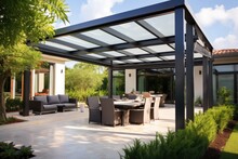 A Stylish Outdoor Patio Pergola That Allows The Sunlight To Filter Through Its Metallic Structure.