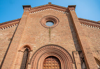 Wall Mural - The façade of the church of Santa Croce (Holy Cross), built in the 15th century in Gothic style, in the town center of Fontanellato, province of Parma, Italy