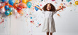 © MarianoMartin - Delighted little girl with colorful balloons and confetti.