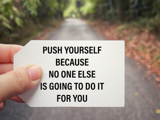 Wall Mural - Motivational and inspirational wording. Push Yourself Because No One Else Is Going To Do It For You written on a white paper. With blurred styled background.