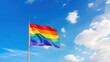 © tashechka - Lgbt flag over a blue sky