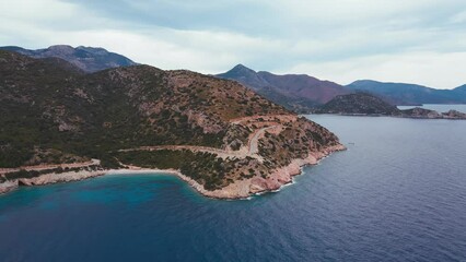 Wall Mural - Beautiful coastal road along Aegean sea in Turkey. Aerial wide shot