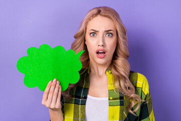 Sticker - Photo of shocked impressed woman dressed checkered jacket holding speaking cloud empty space isolated purple color background