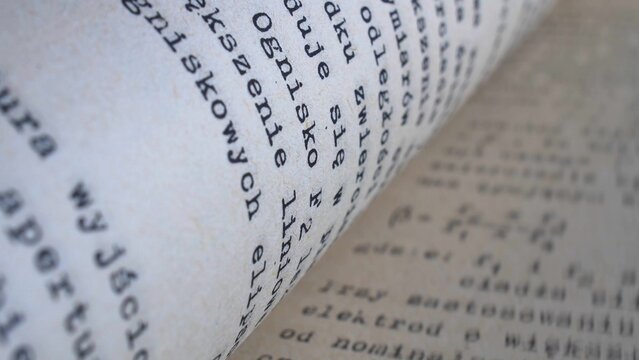Flicking Through Old Typescript Technical Book Pages Close-up