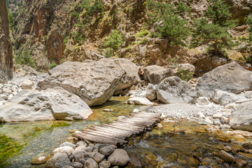 Wall Mural - View of The Samaria Gorge and walking passage over the stream, Crete, Greece