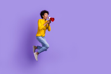 Wall Mural - Full length size view photo of funny crazy man jumping with megaphone loudspeaker proclaim announce isolated on violet color background