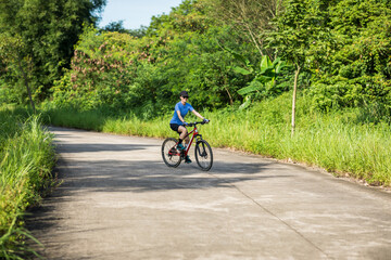 Poster - Riding bike in spring forest