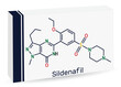 Sildenafil molecule. It is drug for the treatment of erectile dysfunction. Skeletal chemical formula. Paper packaging for drugs. Vector