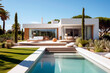 Leinwandbild Motiv Luxury modern vacation home with a swimming pool. Sunbeds, relaxing vacation Mediterranean