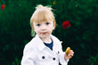 © Анна Молько - cute girl with cookies in a white jacket