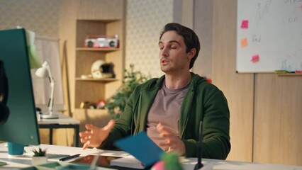 Wall Mural - Angry freelancer screaming at monitor workplace. Stressed man gesturing hands