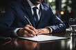 © Gonzalo - Close up of businessman signing a contract.