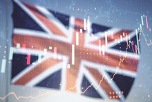 Multi Exposure Of Virtual Creative Financial Graph And World Map On British Flag And Sunset Sky Background, Forex And Investment Concept