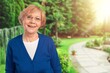 © BillionPhotos.com - Happi senior woman standing at park