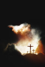 The Passion Of Jesus Christ On The Hill Of Golgotha With A Bright Sunset Dramatic Sky And Clouds Background And The Cross Of Passion Week, A Symbol Of Jesus' Death And Resurrection
