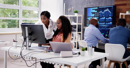 Poster - African Financial Data Analysts Using Dashboard On Screens