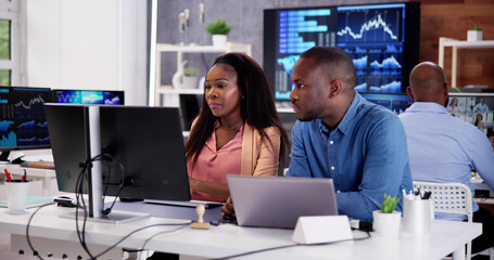 Poster - African Financial Data Analysts Using Dashboard On Screens