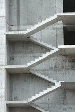 Stair Flights And Floors Of The Building At The Construction Stage. Vertical Photo.