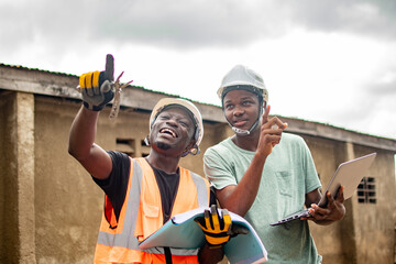 two african engineers discussing something