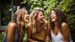 three young women girlfriends sitting together laughing about the latest gossip