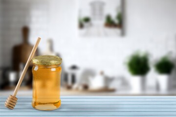 Canvas Print - Sweet tasty Honey in bowl with dipper