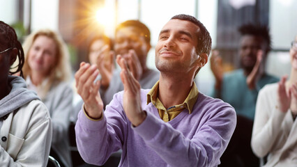 Wall Mural - Seminar business meeting applause speaker. Crowded smiling audience clapping person speech.