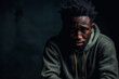 © Creative Clicks - Black african american man depicting a sad depressive state, depression concept