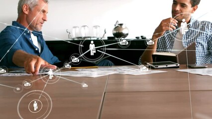 Poster - Animation of network of digital icons over two caucasian men discussing over documents at office