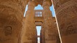 Karnak Temple in Luxor, Egypt. Camera moves between majestic columns with ancient Egyptian drawings. Gimbal high quality shot