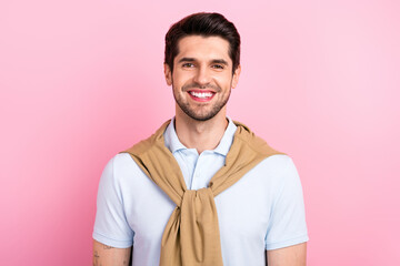 Poster - Portrait of satisfied positive young man beaming smile good mood hang shoulders sweater isolated on pink color background