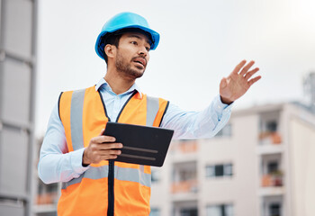 Poster - Asian man, architect and tablet in city for management on construction site, inspection or coordination. Male person, engineer or contractor working on technology for architecture or maintenance