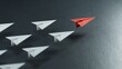 Successful Leadership Concept Red leader paper planes and followed by white white planes. Strategic planning development.3D rendering on black background.
