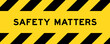 Yellow and black color with line striped label banner with word safety matters