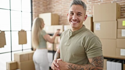 Poster - Man and woman ecommerce business workers scanning packages smiling at office