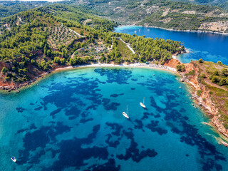 Wall Mural - aerial view of the impressive kokkinokastro beach at alonissos island, sporades, greece, with red cl