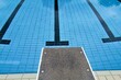 swimming line and a staring block at a outdoor pool