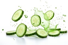 Cucumbers Falling Isolated On White