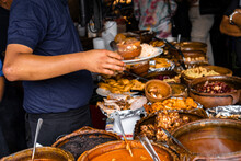 Variety Assortment Of Local Traditional Guatemalan Food Served In Big Rustic Clay Pots