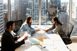© Maria Vitkovska - Portrait of smiling positive business people working in modern office, planning project, discussing