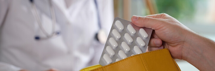 Poster - Close-up of doctor explaining to patient about medical pills and giving prescription in clinic.