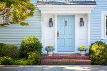  Blue Front Door Of Traditional Style Home.  A Front Entrance Of A Home With A Blue Door.