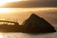 Silhoutte Of The SS Palo Alto Near Sunset, An Old World War II Shipwreck Off The Coast Of Aptos, Californa