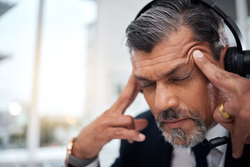 Wall Mural - Stress, call center and face of man in customer service agency with pain, burnout or anxiety. Headache, frustrated and tired salesman consulting with challenge, client problem and fatigue for mistake