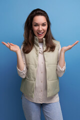 Sticker - well-groomed caucasian brunette young lady in casual style on studio background