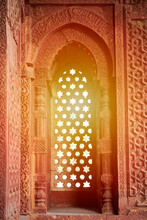 Decorative Window Shutters Of Alai Darwaza Landmark Part Of Qutb Complex In South Delhi, India, Red Sandstone And Inlaid White Marble Ancient Window Decorations With Sunlight